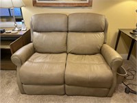 Leather loveseat, recliner. Reclines