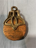 Antique wooden rope pulley