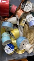 Large tub filled with misc ribbon