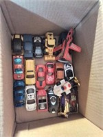 Box of Matchbox style cars and other