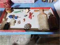 Shoe box lid of bottles and other small items