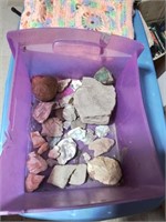 Purple container of interesting rocks