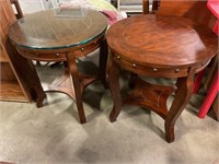 2 round side tables 1 has glass for top