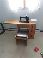 Singer sewing machine and cabinet with bench