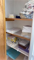 Closet, full of towels and bedding