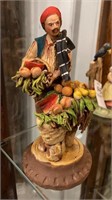 Vintage pottery terra cotta figurine fruit seller