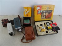 Assortment of Vintage Cameras Boxes Accessories