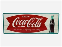Drink Coca-Cola "enjoy that refreshing new