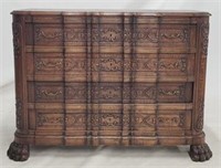 Heavily carved oak claw foot 4 drawer chest