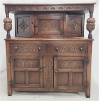 English Jacobean carved oak cupboard