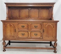 English carved oak sideboard with rack