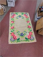 Tan flowered rug 34" x 55"