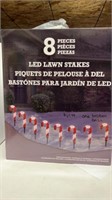 $68 eight LED lawn stakes 1 broken base