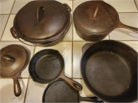 Lot Of Nine Pieces Of Cast Iron Cookware