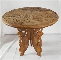 Small Moroccan-style carved side table