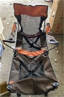 Folding camping chair with foot rest