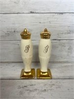 Gold color salt and pepper shakers