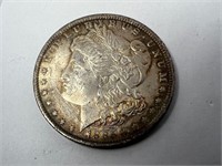 1885 O Morgan silver dollar