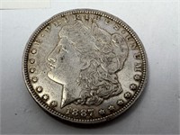 1887 O Morgan silver dollar