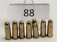Unmarked 7 Heavy Brass Toy Bullets for Bandolier