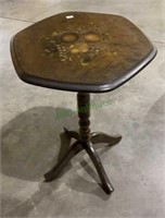 Antique wooden four-legged slant top table with