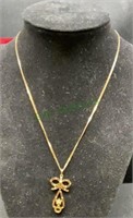 14k gold herringbone necklace with a 16 inch