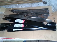 Lot of assorted lawn mower blades many are new