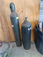 Two oxygen and acetylene tanks