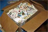 BOX OF MOSTLY USED STAMPS