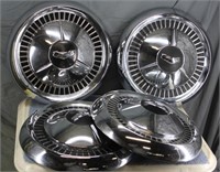 SET OF 4 VINTAGE HUBCAPS - NICE CONDITION