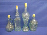 (4) Corked Bottles