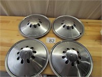 Four 1970--1972 Plymouth Duster Hubcaps