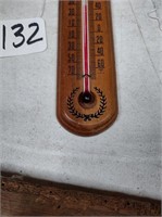 Wood framed wall thermometer