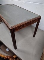 Small brown wood w/ glass top coffee table,