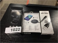 True wireless earbuds, usb cable, charger pad