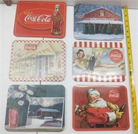Collection of six Coca-Cola trivets