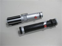 Two Plastic Retractable Star Wars Light Sabers