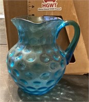 Blue glass thumbprint pitcher