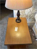 Wooden end table and vintage lamp