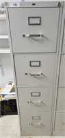 Filing cabinet, comes with lots of 3 ring binders!