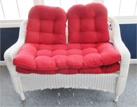 White wicker style love seat w/cushions