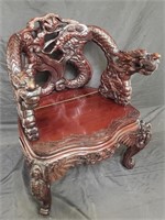 Vintage Asian carved dragon arm chair