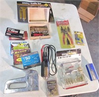 Tools, snap ring plier, tester, carving kit.