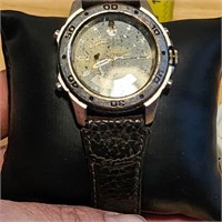 Silver faced watch with black band