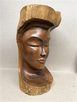 Hand carved woman’s face