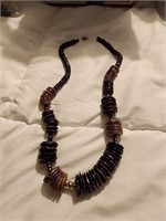 Found in world traveler unit disk bead necklace