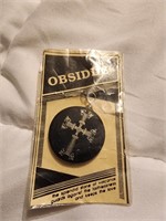 World Traveler Unit treasure Obsidian cross charm