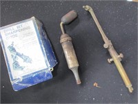 antique grease gun, torch, bit sharpening guide