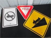 snowmobile and yield signs