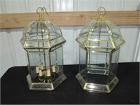 two brass lamps